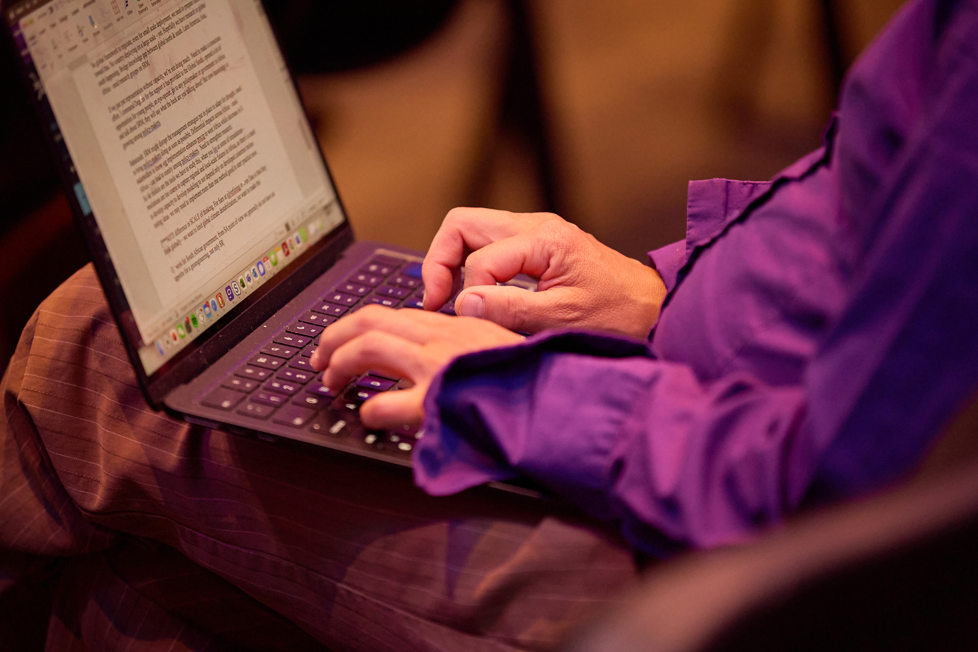 Person typing on a laptop