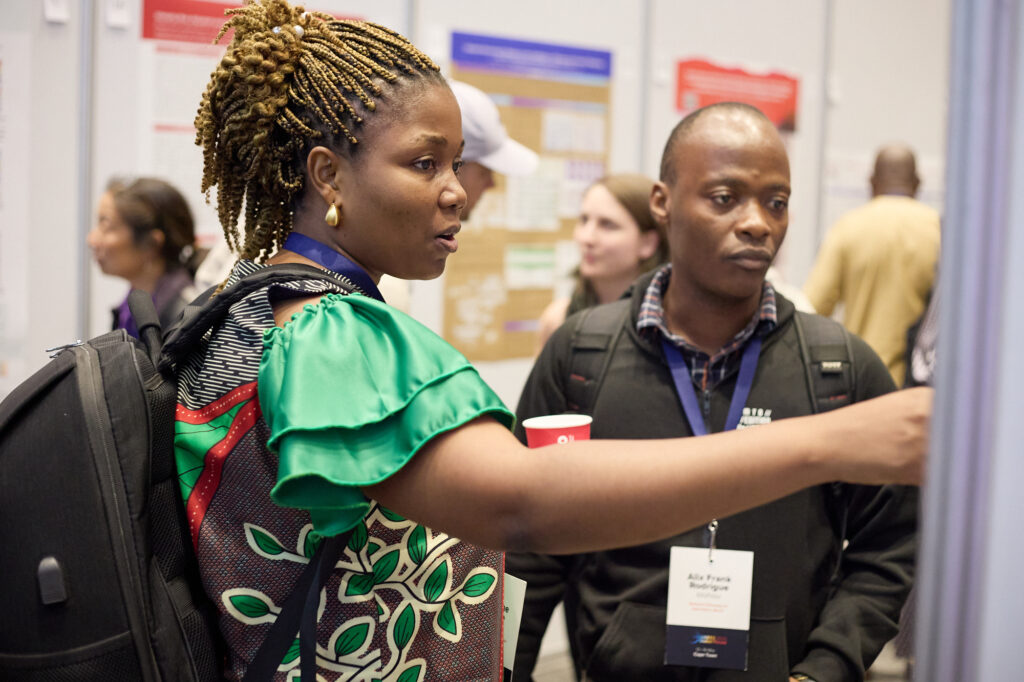 Woman pointing at a poster